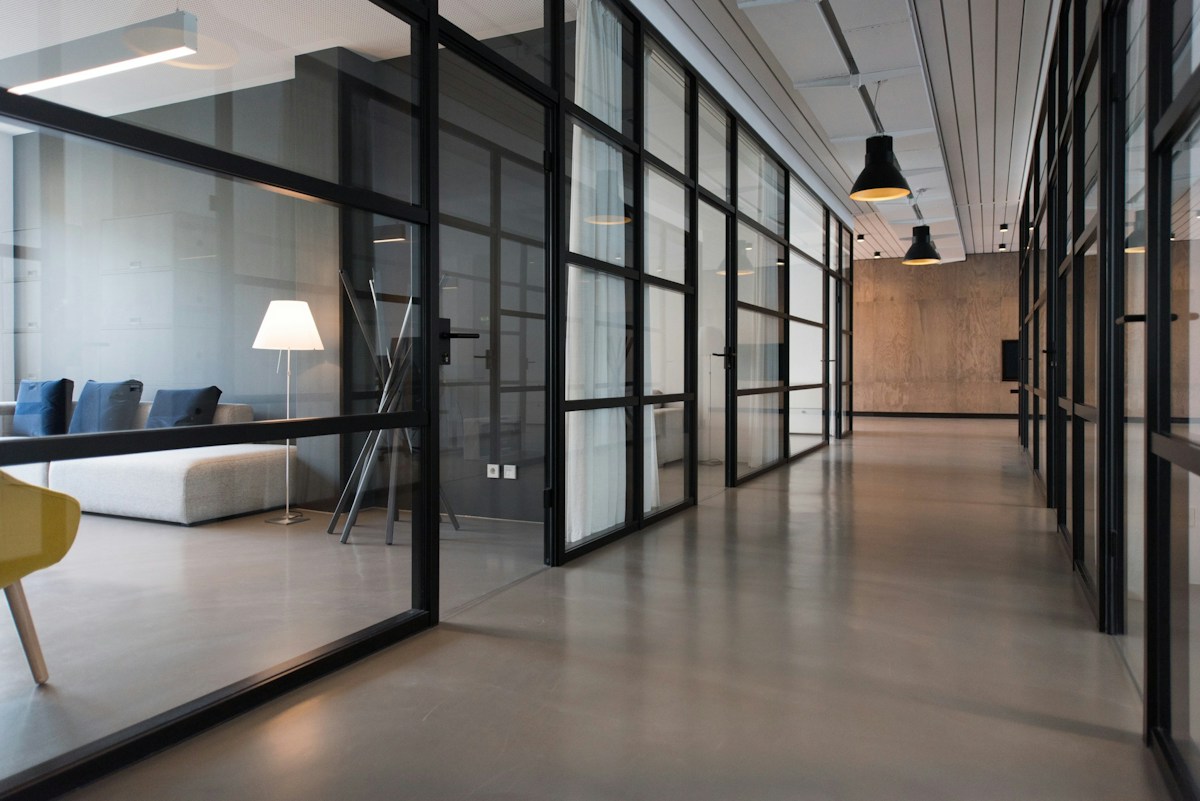 A bright shared workspace designed around openness, comfort, and collaboration